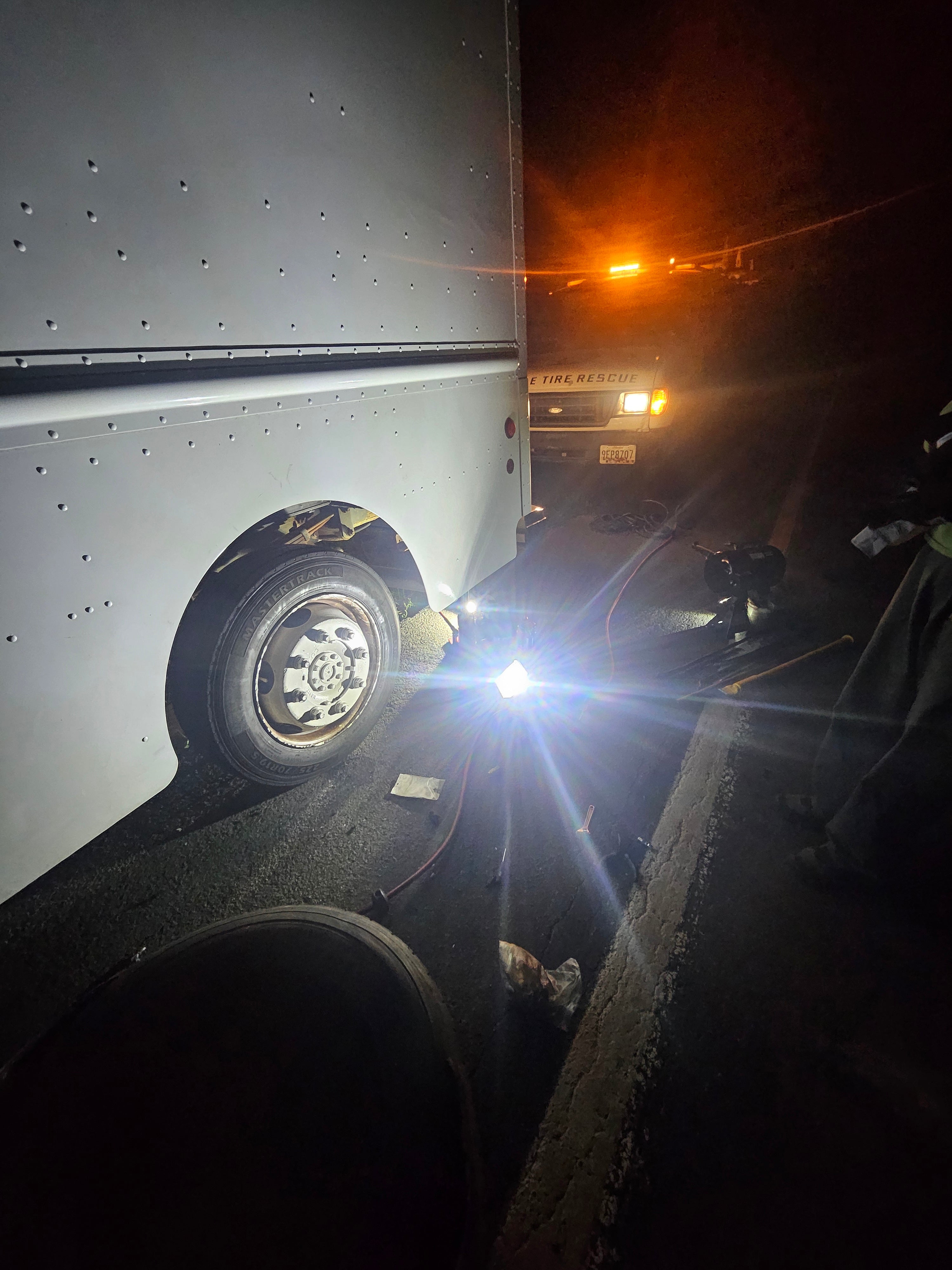 225/70R19.5 tire mounted on a box truck in the middle of the highway